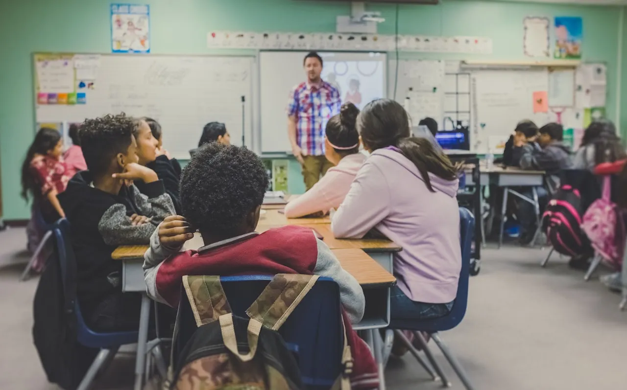 Students in classroom with phones